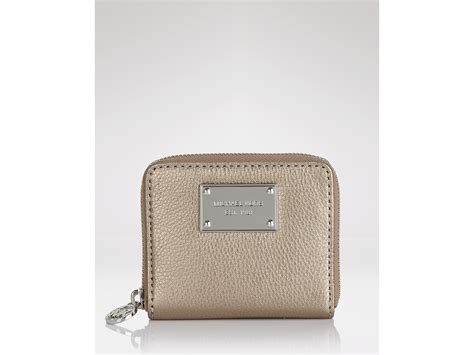 michael kors jet set small zip around wallet|bolso Michael Kors jet set.